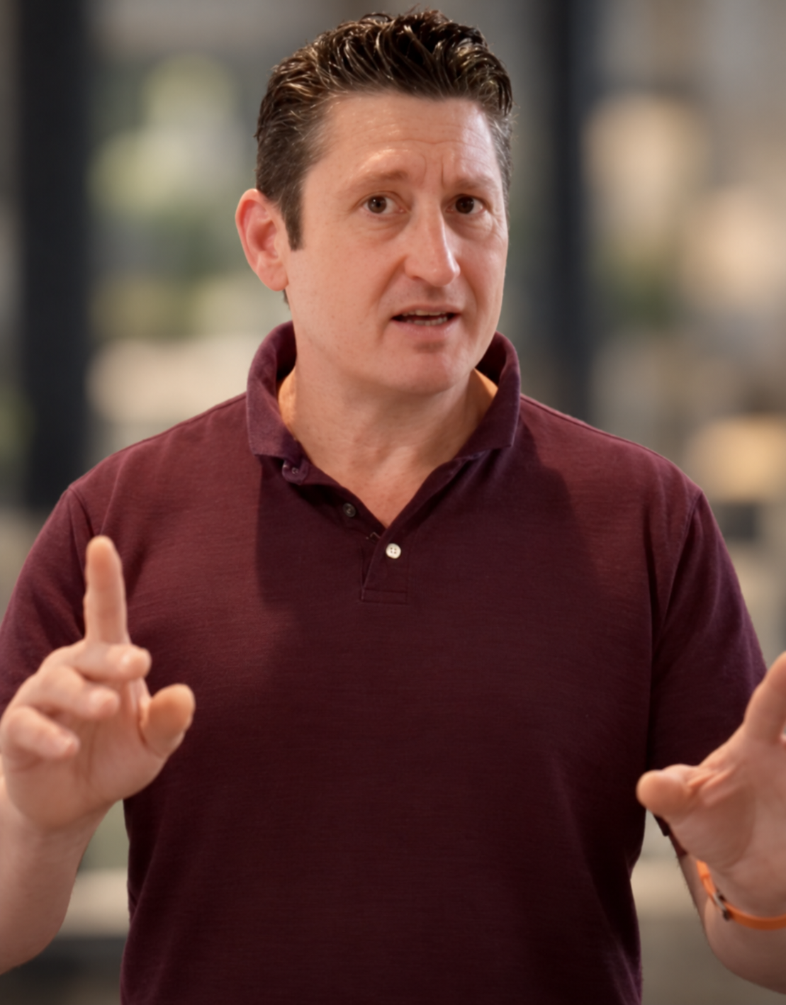 John Knight speaking, shown from the waist up